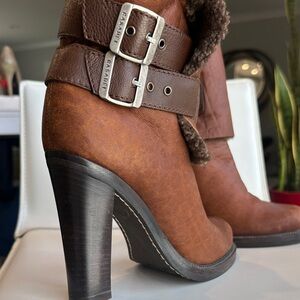 Brown leather shearling-lined heeled boots by Casadei